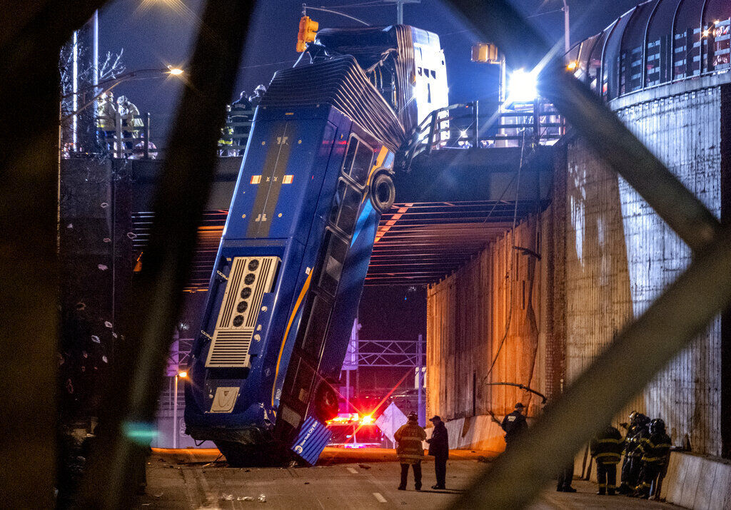 APTOPIX Bus Crash Overpass